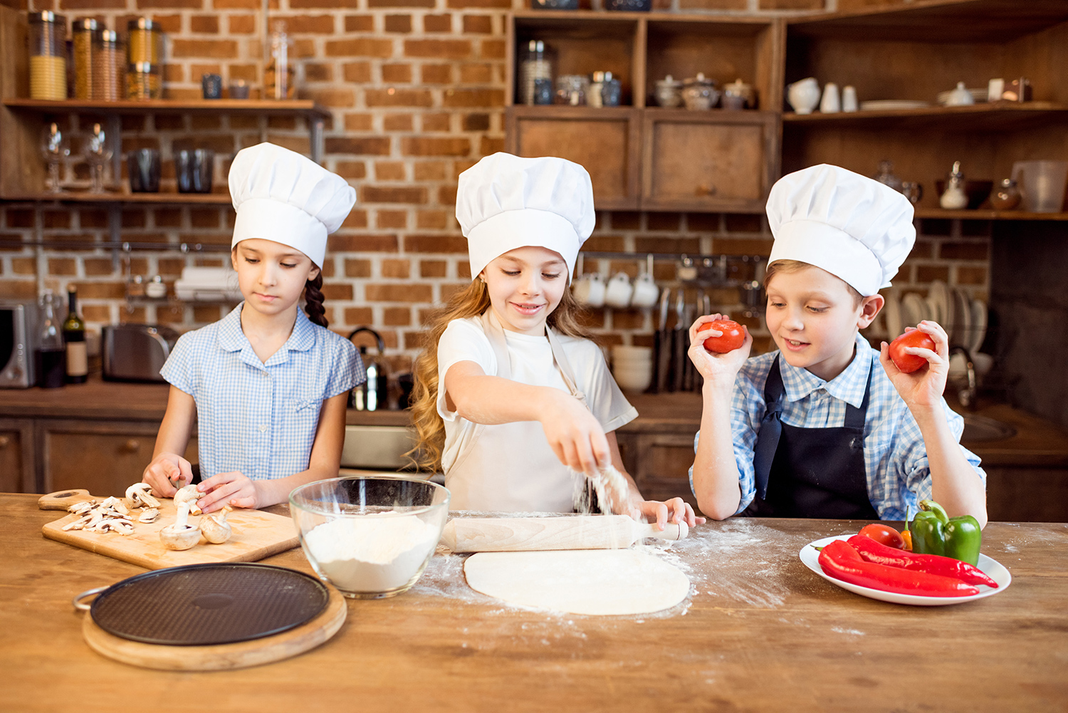 Children Making Pizza.