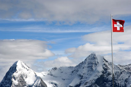 swiss flag on a mountain